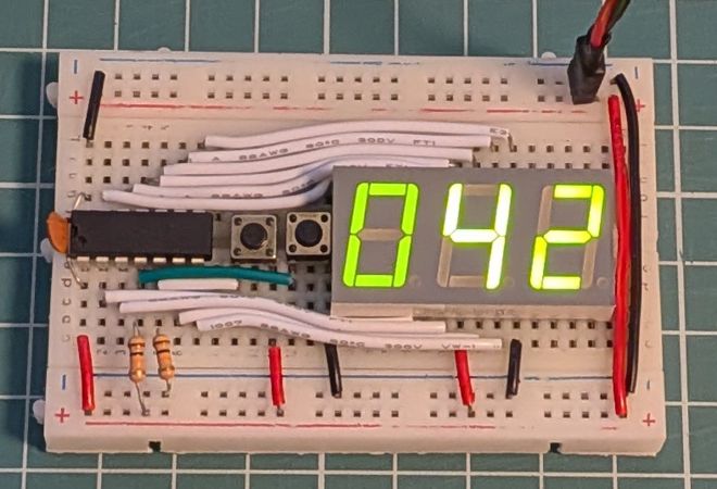 Microcontroller version of the digital counter on a half breadboard